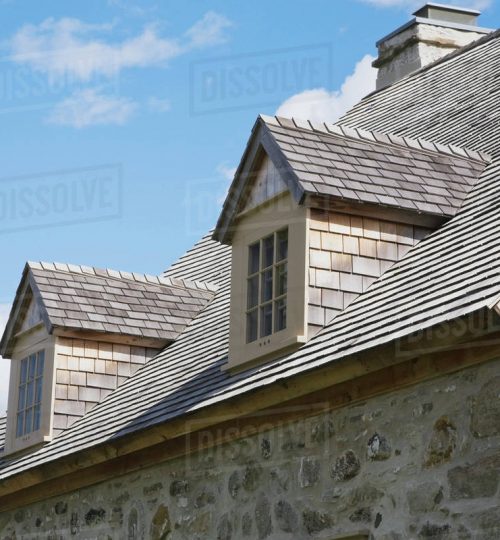 view-of-the-cedar-shingles-roof-and-dormer-windows-on-an-old_dormers-framing-styles